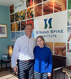 Dr. Neil Fico with a Strand Spine patient