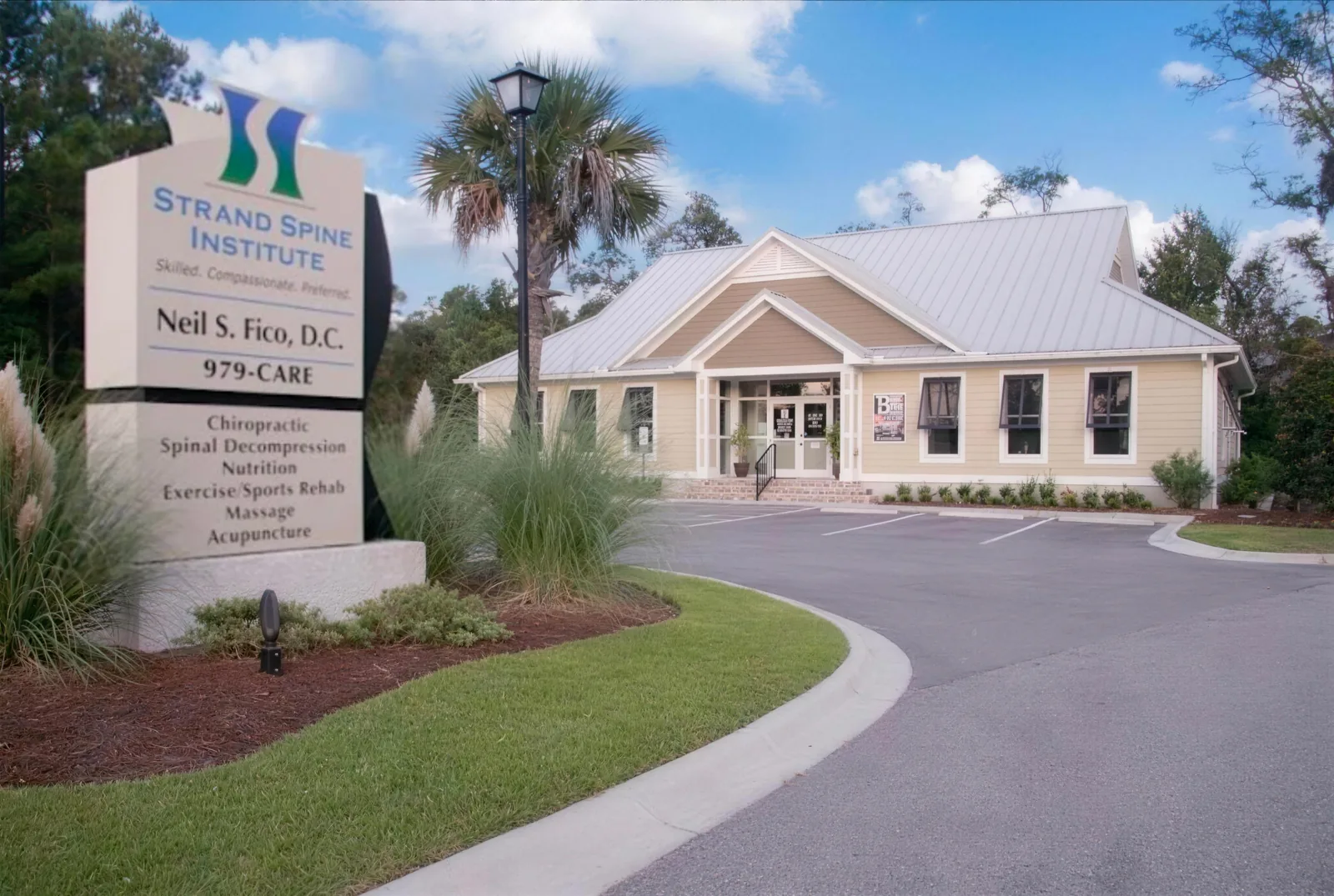 The Strand Spine Institute building and monument sign on Ocean Hwy in Pawleys Island